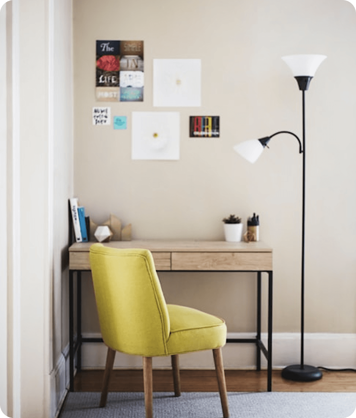 Cozy workspace with green chair